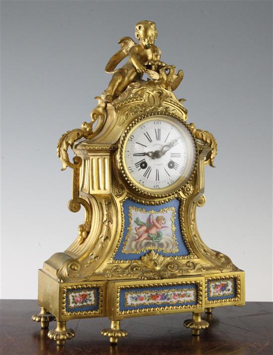 A 19th century French ormolu and Sevres style mantel clock, 14.5in.